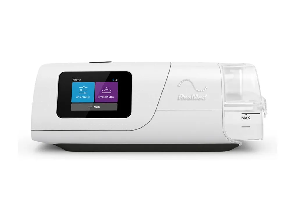A ResMed AirCurve 11, seen front on with its humidifier attached