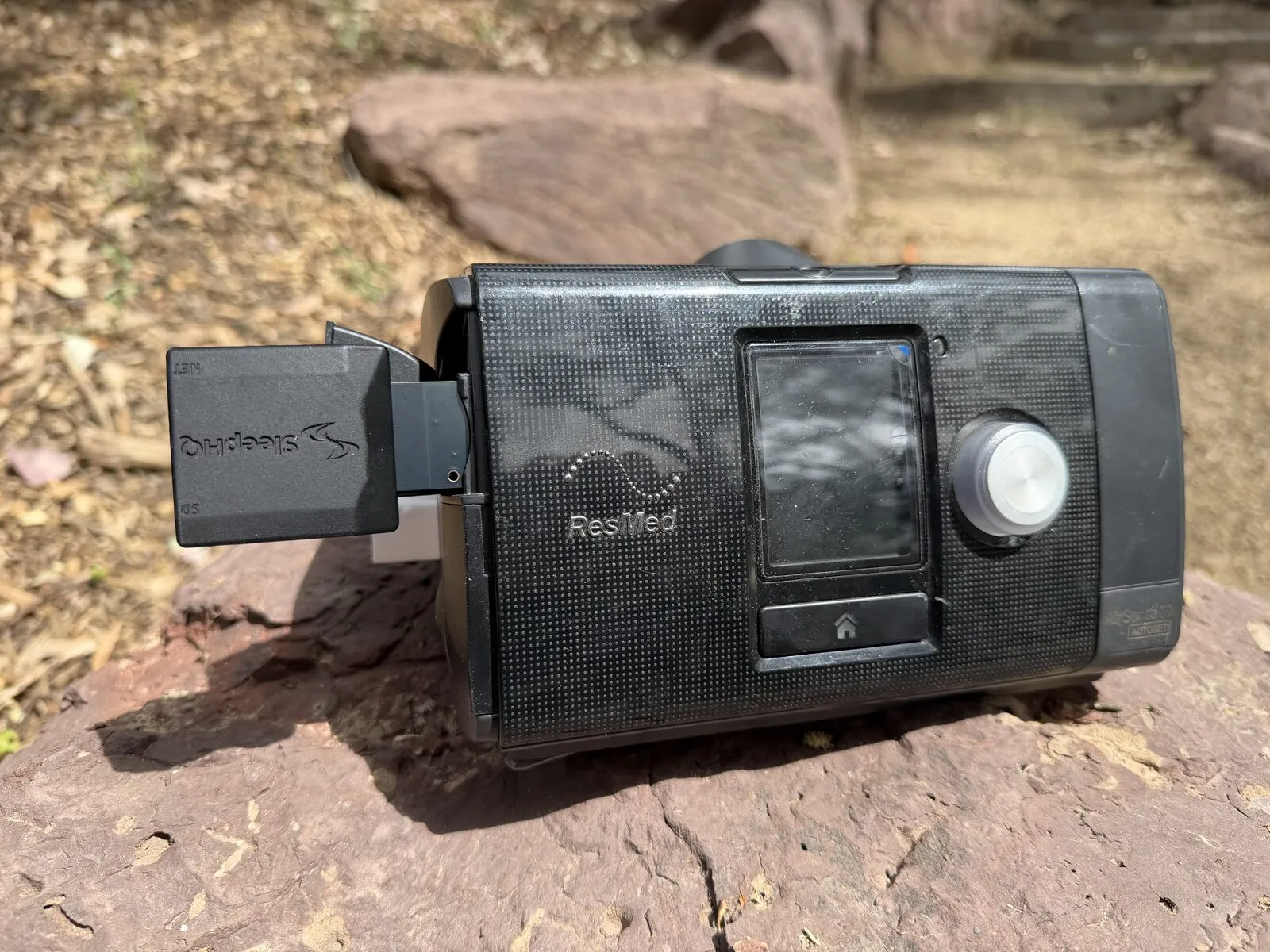 A MUX inserted in the SD card slot on the side of a ResMed AirSense 10